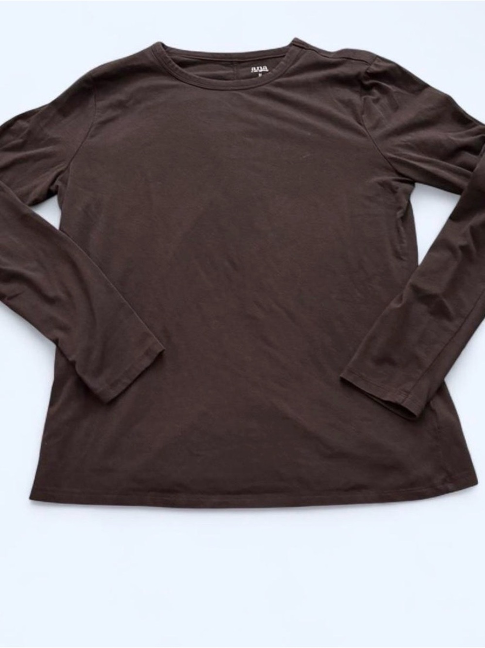 Brown long sleeve cotton blend shirt.
